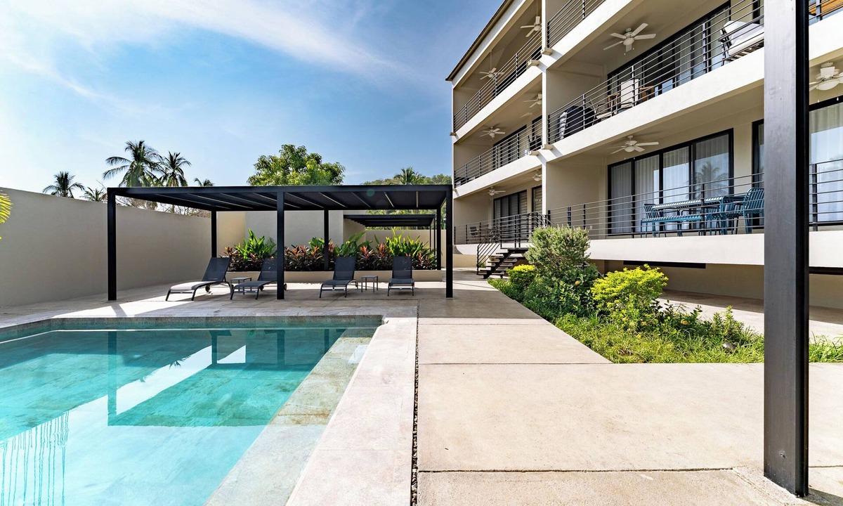 P Chahue Condo | 1 BR Solana 1st Level Condo | Walk to Beach & Town