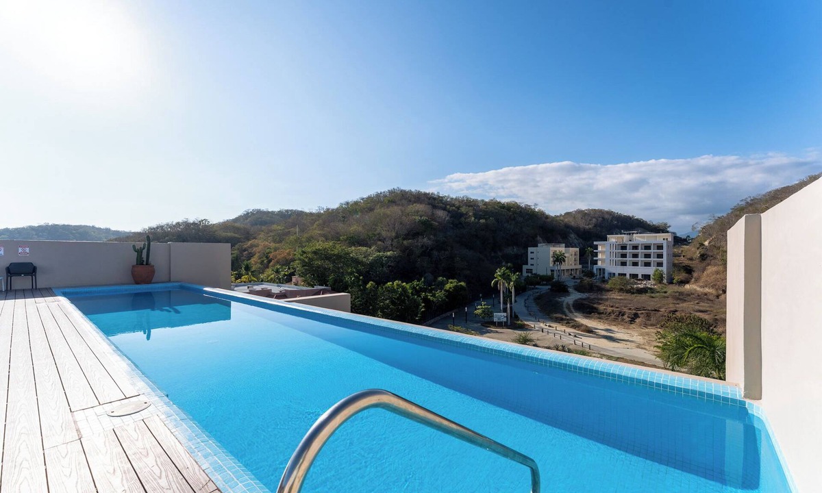 P Chahue Condo | 2BR Condo Steps to Beach | Costta A Santa Cruz