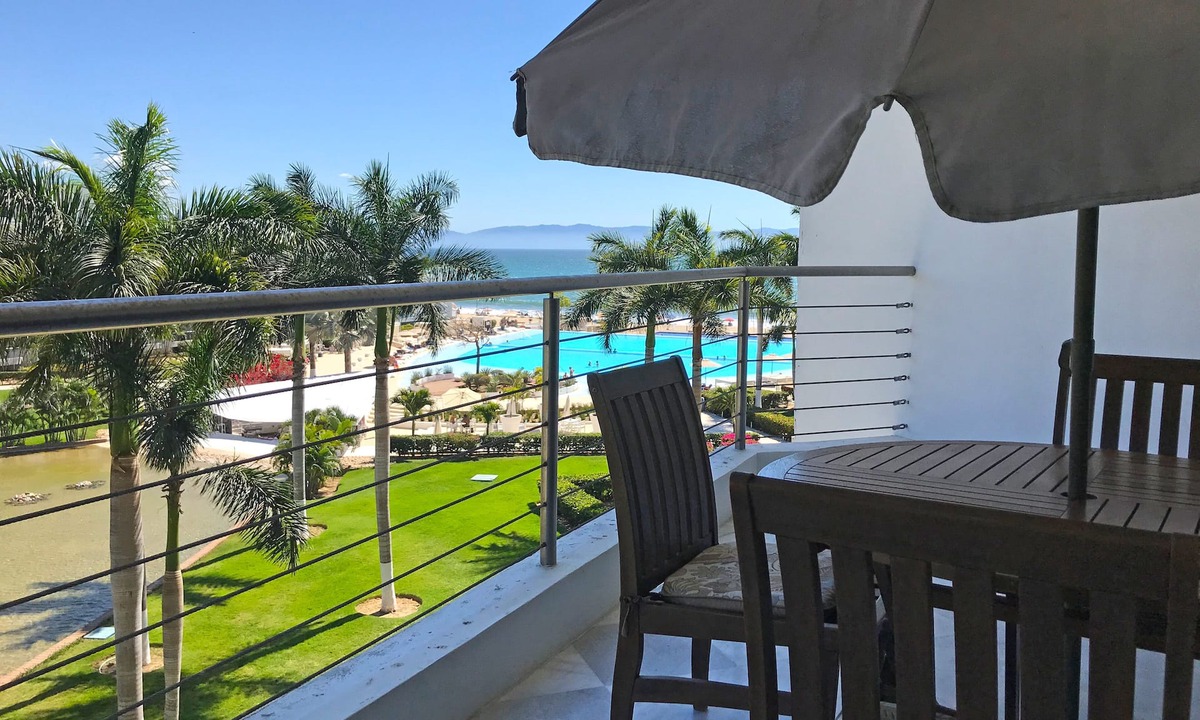 Flamingos Apartment | Beach-front spectacular view, sandy beach & beautiful oversize pools