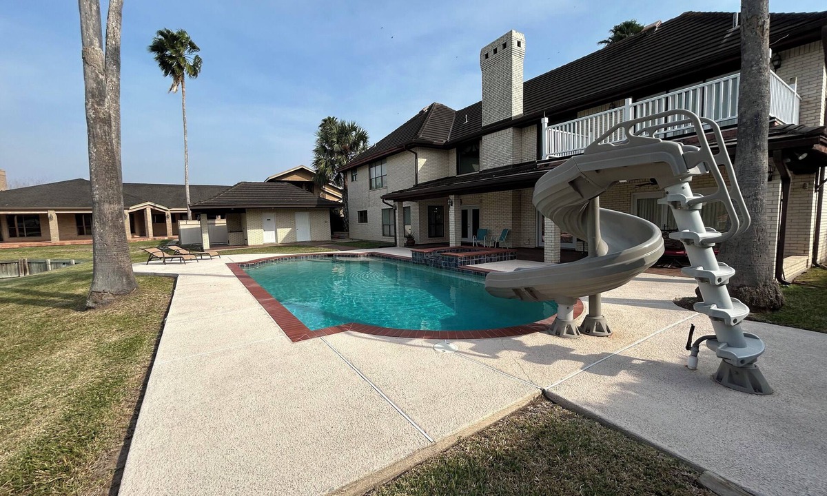 Harlingen House | Beautiful Harlingen Home with Heated Pool, Hot Tub, & Waterslide! Sleeps 19!