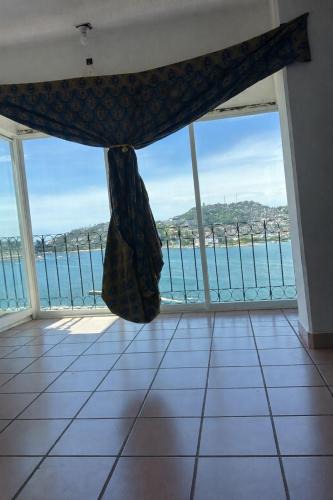 Caleta Apartment | Bonito departamento con vista al mar y alberca