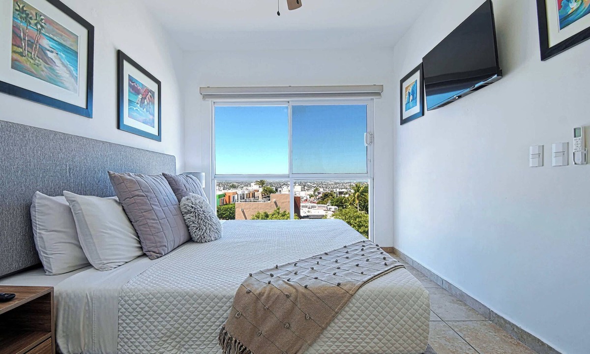 Lomas de Palmira Condo | Breathtaking Ocean Views, Pool & Balcony Bliss
