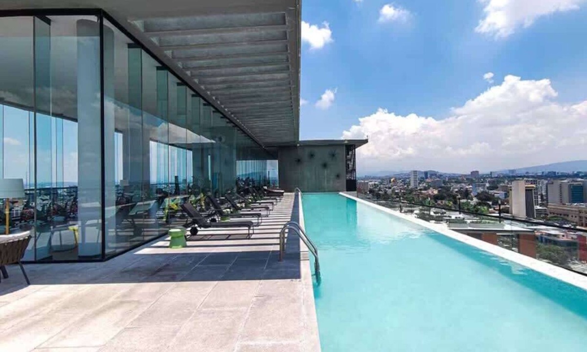 Zona Minerva House | Bright 3BR | Pool, gym & city views
