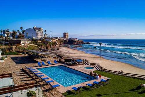 La Paloma House | Bright Dog-Friendly Villa with Beach Views, Private Patio, Outdoor Pool, Kitchen