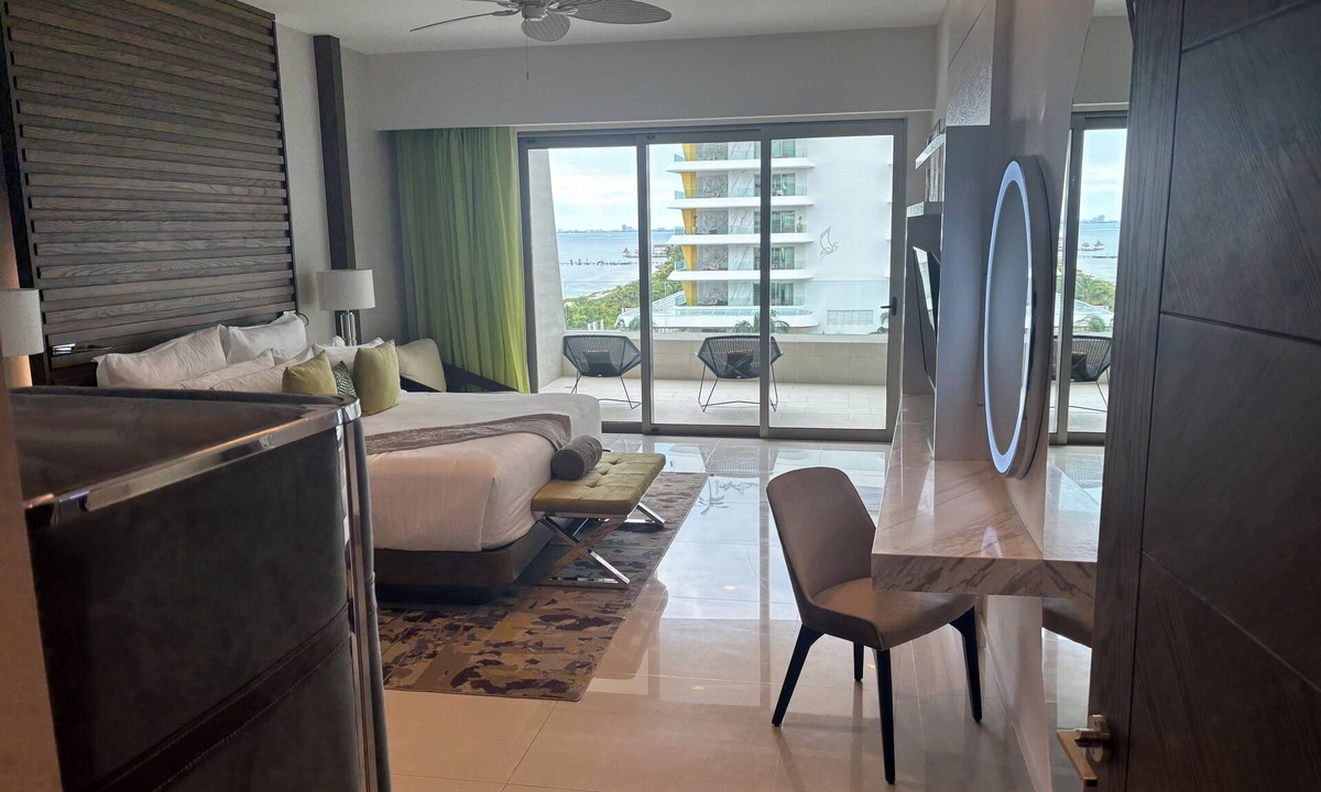 Puerto Juarez Apartment | Bright Junior Suite perfect for romance and relaxation.