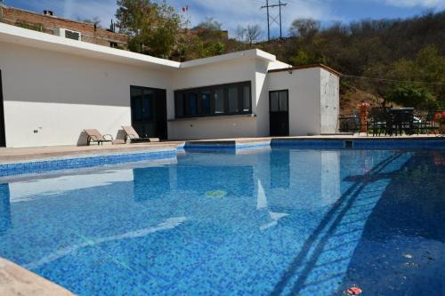 Alamos House | Casa de Cuatro Vientos