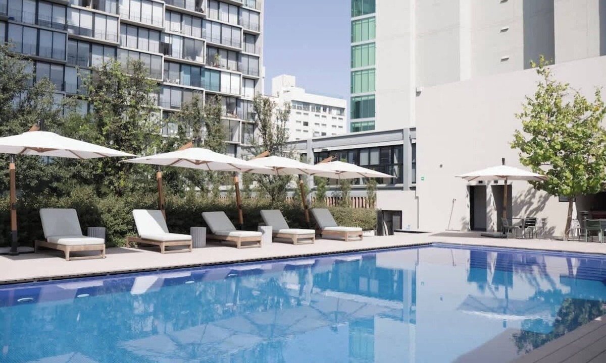 Providencia Condo | City-view condo w/pool & free parking