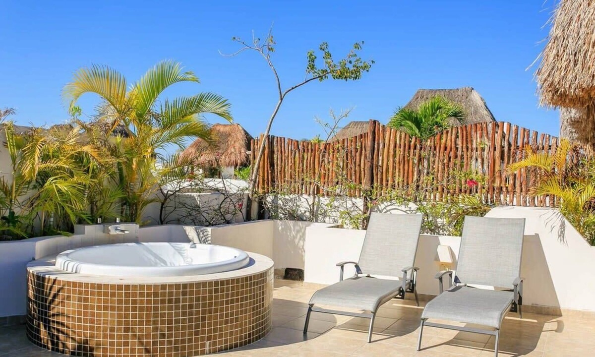 Zama Apartment | Coastal Luxe Penthouse: Rooftop Jacuzzi & Grill