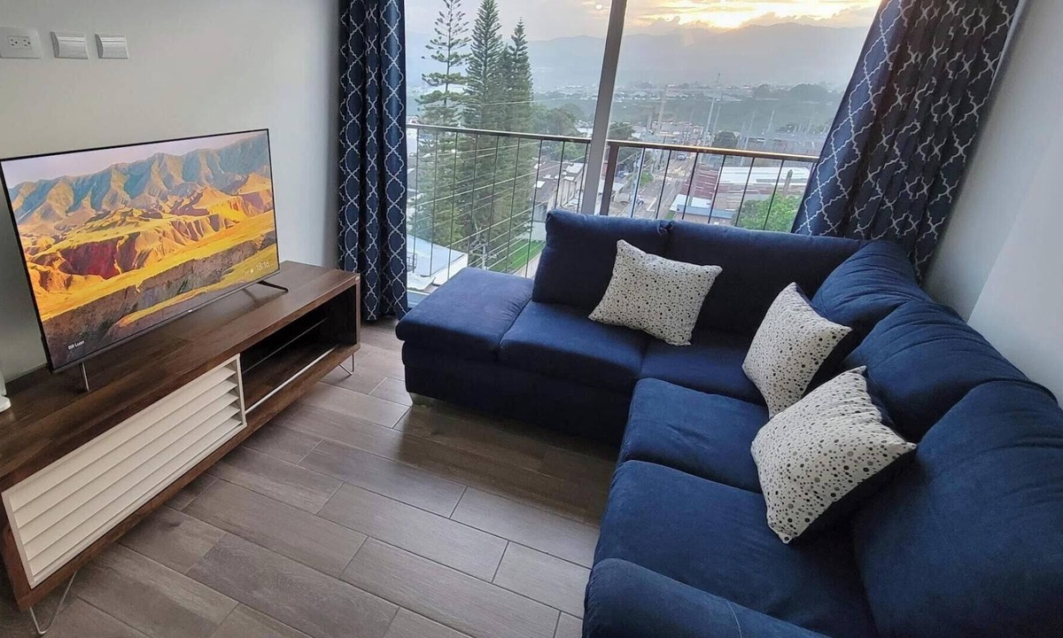 Zona 12 Apartment | Cozy apartment, your family will be close to everything. City & volcanoes views.