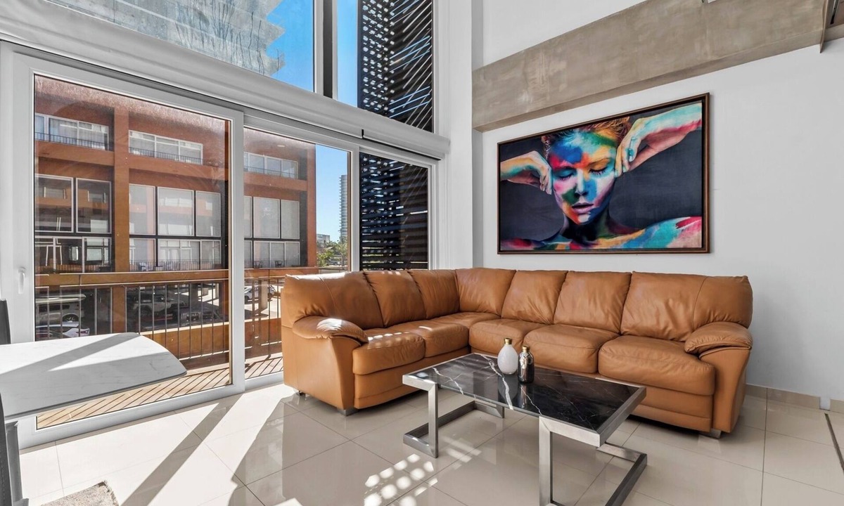 North Hotel Zone Apartment | Double-height loft in Zoho Skies | Rooftop pool