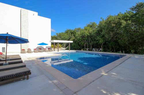 Akumal Apartment | Exceptional 2Story Penthouse with Hot Tub and Rooftop Terrace in Bahia Principe