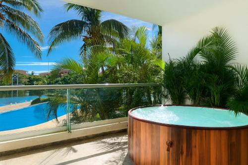 Puerto Aventuras Apartment | High-End Waterfront Condo at Secrets Waters