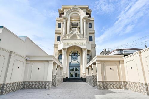 Tan An Hotel | Khách sạn Neva
