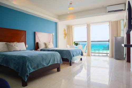 Punta Cancun Apartment | Oceanview 1 min walk to Coco B, pool, beach od110