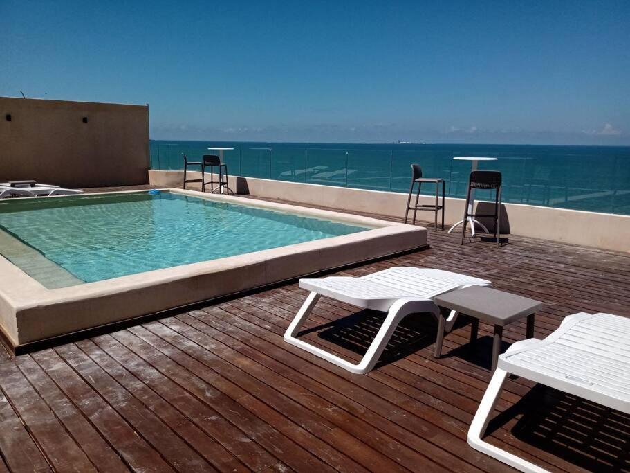 Chicxulub Puerto Apartment | OLEA Beach Condos en Chicxulub Puerto