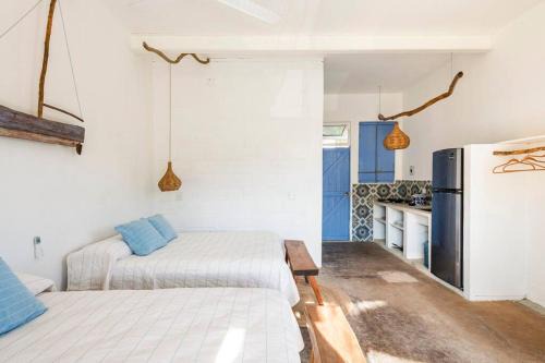 Santa Maria Huatulco House | Palm House - Tropical casita by Surf and Beach