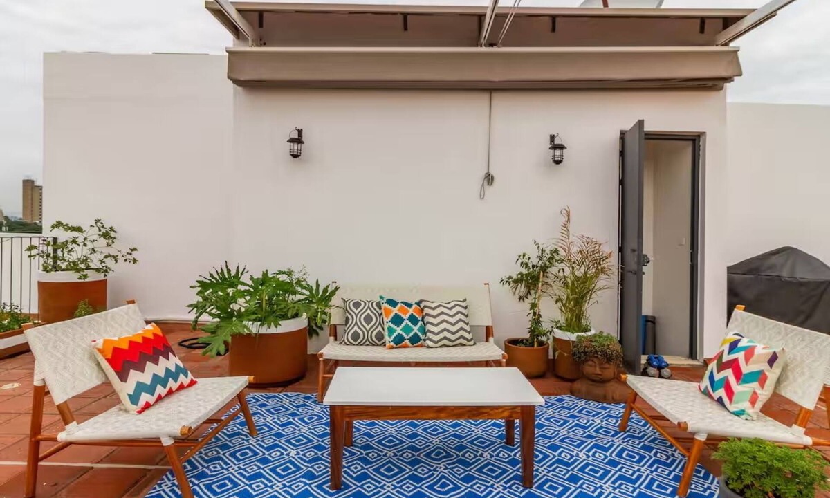 Americana Condo | Penthouse with private rooftop and panoramic views