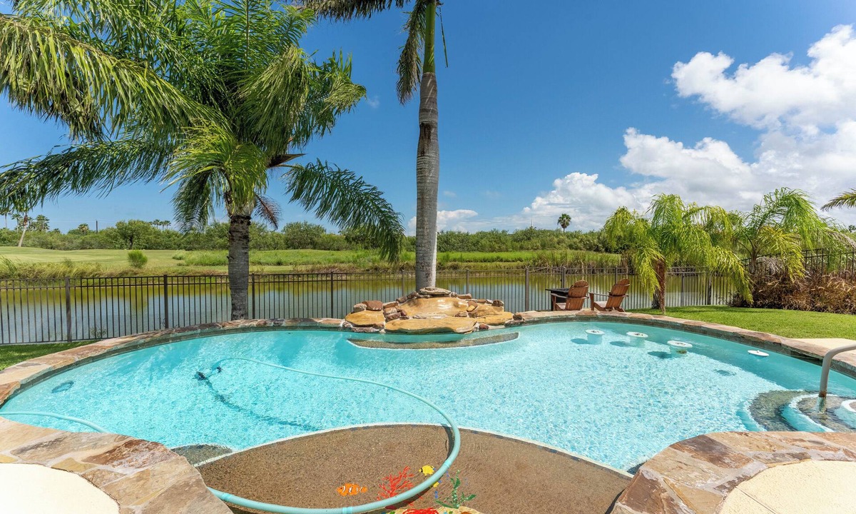 Laguna Vista House | Poolside Bliss/fenced yard/water views/golf/pickleball/pets/tennis/extended stay