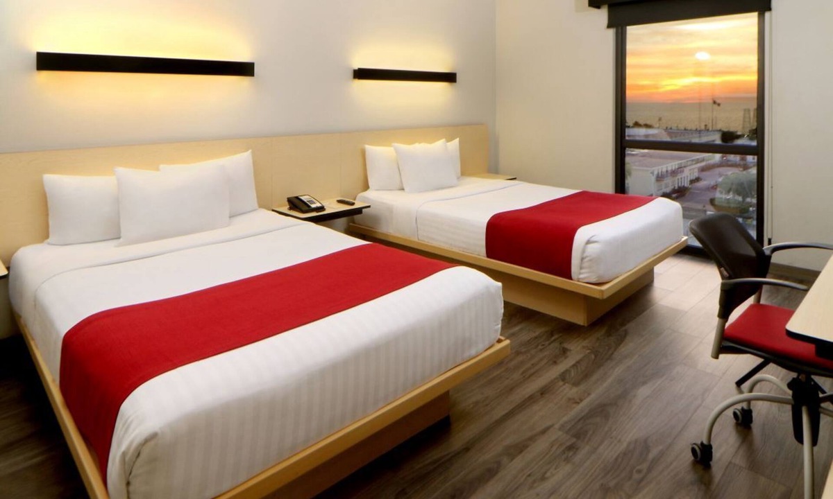 North Hotel Zone Hotel | Prime Location Room with Cozy Touches Ideal for Exploring Beaches