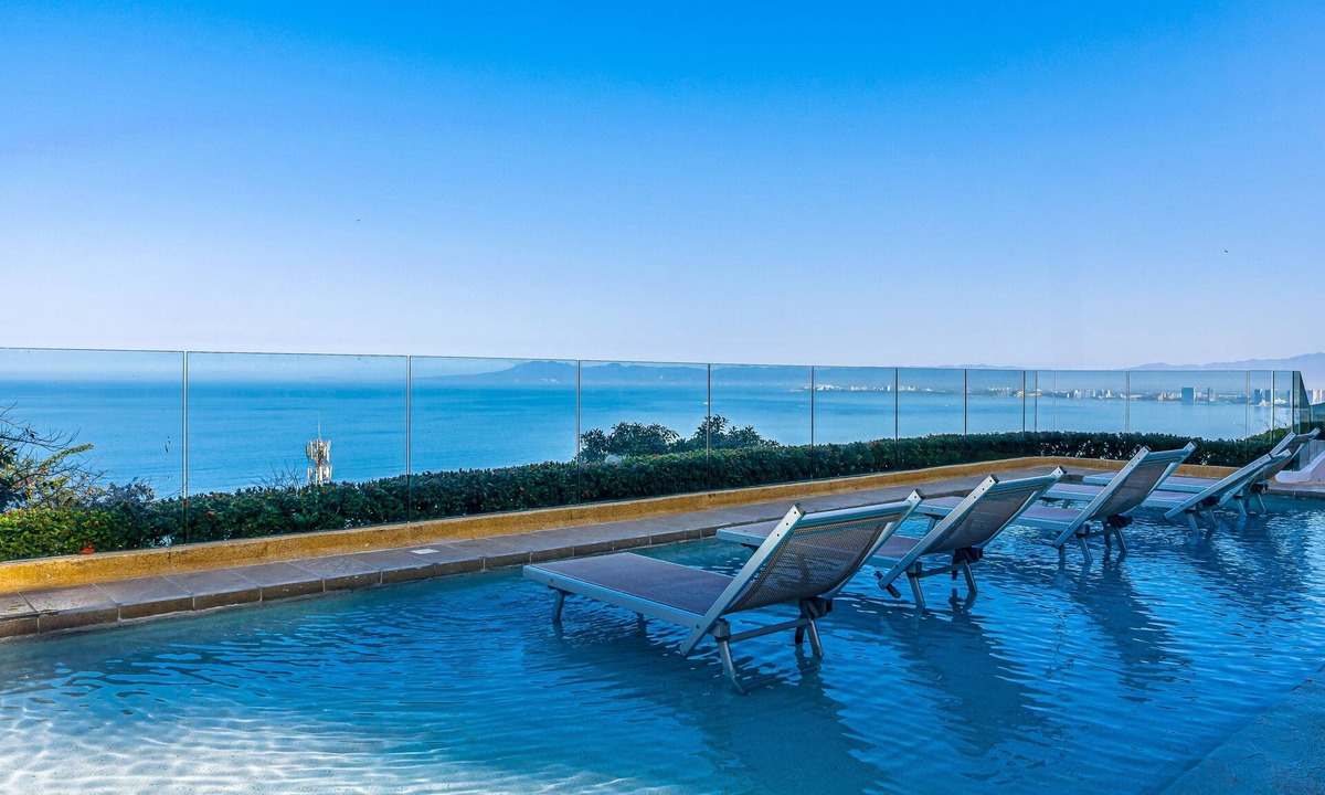 Conchas Chinas Apartment | Relaxing coastal escape with panoramic views, pool, hot tub & sunny terrace