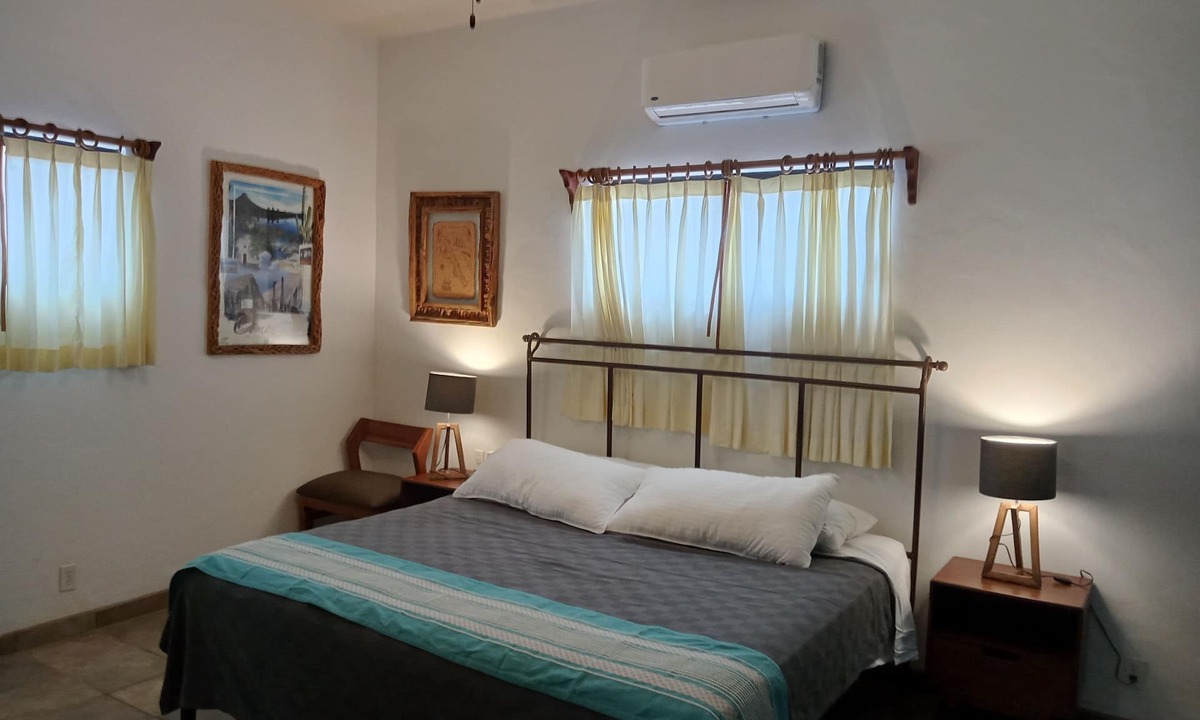 La Ribera Bed & Breakfast | Room #6 Master with one king size bed, one double bed & one double bunk bed