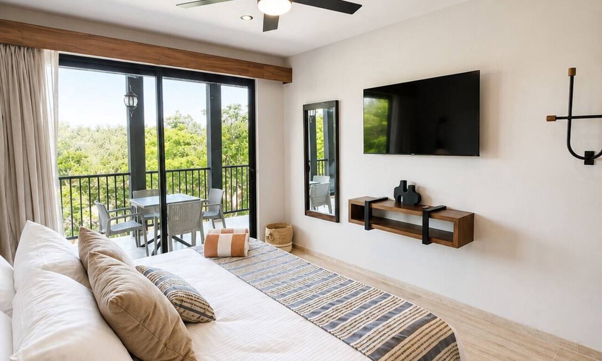 Tulum Condo | Spacious 3-bedroom condominium in Tuk Tulum, ideal for families or small groups seeking comfort, privacy, and strong amenities. Enjoy a private balcony plus access to rooftop pools, paddle court, and underground parking in a great Tulum location.
