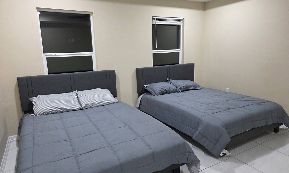 Weslaco House | Spacious 4-bedroom 3 full bath house in beautiful Weslaco with AC. Sun and Fun.