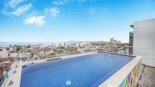 Colonia 5 de Diciembre Apartment | Torre Ku Apartments with Balcony