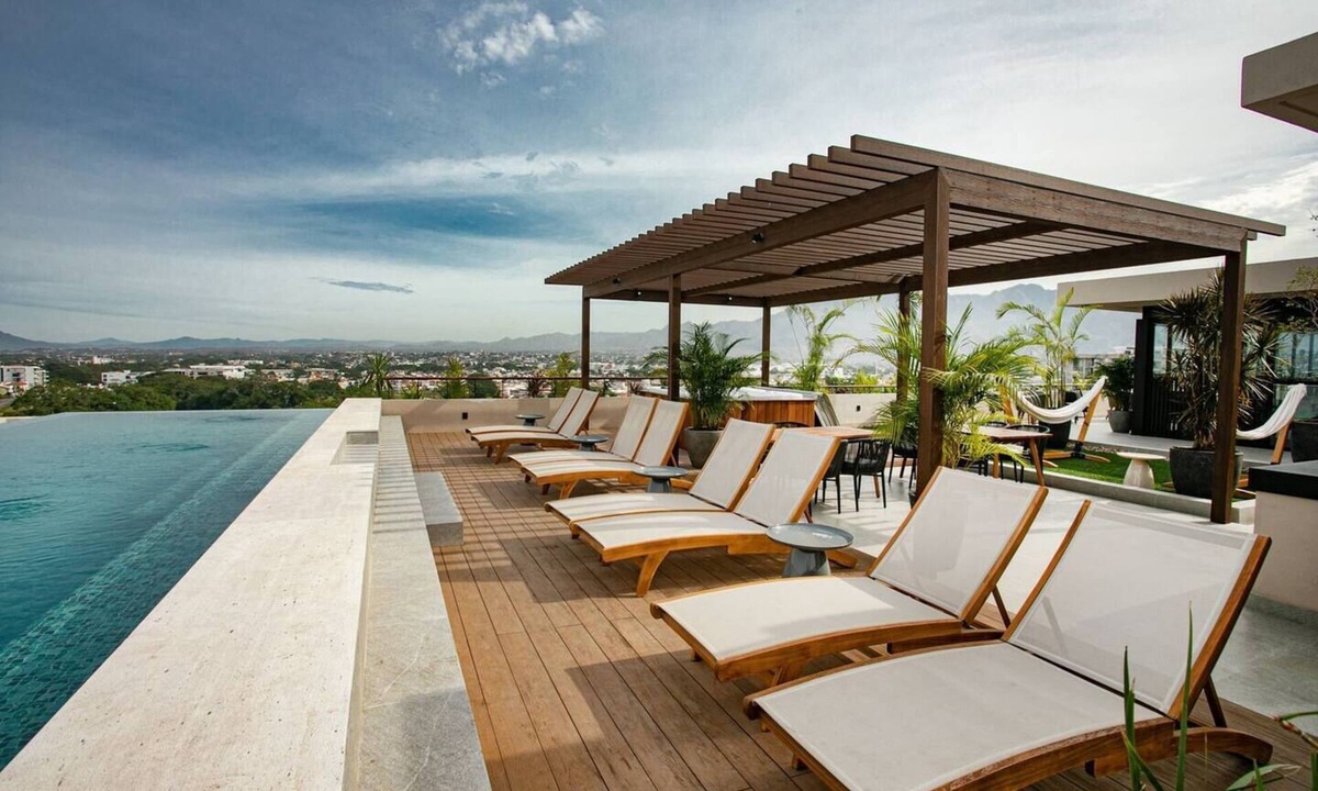 Diaz Ordaz Condo | Upscale 2BR Home + Rooftop Pool