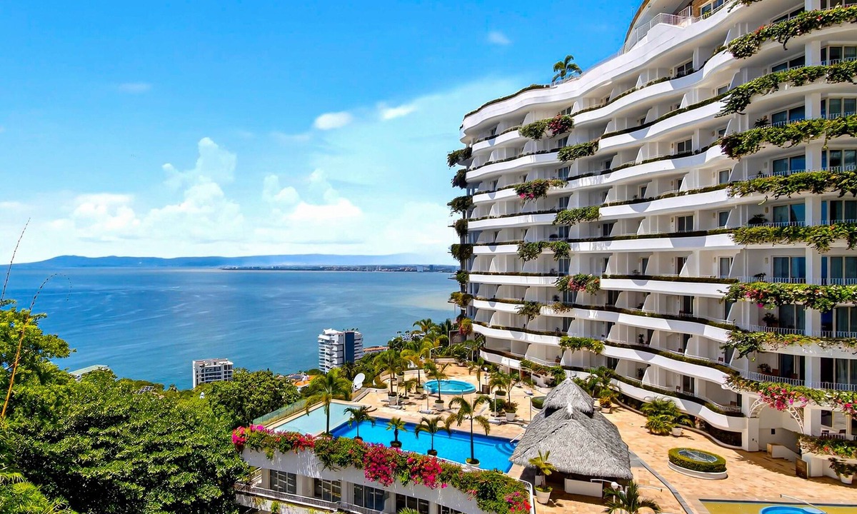 Conchas Chinas Apartment | Upscale bayview villa with hot tub, private terrace, pool & stylish interiors