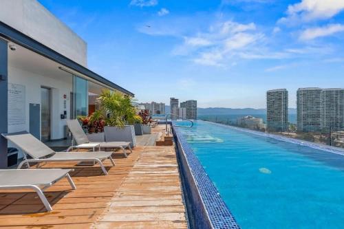 North Hotel Zone Apartment | Zoho Luxury Condo with Rooftop Pool, Gym, Parking