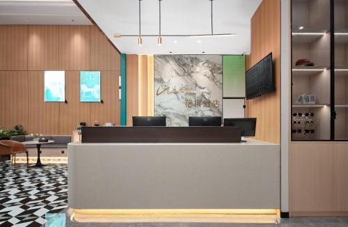 Danzhou Hotel | 花祺巨幕影院酒店 儋州那大镇夏日广场汽车站店