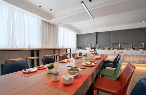 Danzhou Hotel | 花祺巨幕影院酒店 儋州那大镇夏日广场汽车站店