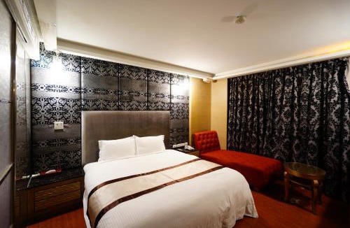 Wuqi District Hotel | 荷村 Motel