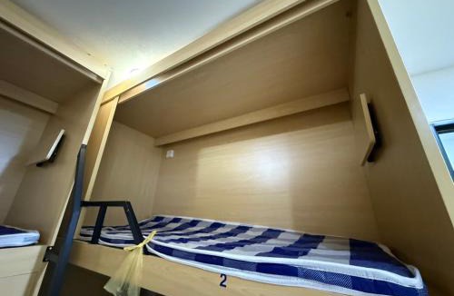 Daan Hostel | 近捷運麟光站的女子上下舖床位
