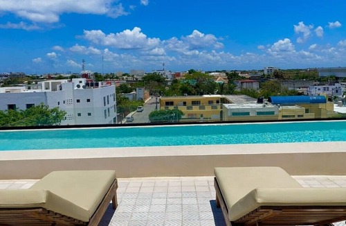 Ejidal House | 1 Bedroom apartment with views to green area and hamacs, Gym, Rooftop Pool