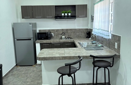Centro House | 1-br bungalow in amazing San Patricio with AC, Pool, and half a block from beach