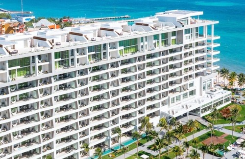 Puerto Juarez Resort | 2-bedroom suite at Garza Blanca Cancun, offering luxury, beach, and excitement.