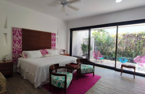 Crucecita Condo | 2 BR Patio Oasis Steps from Beach & Supermarket