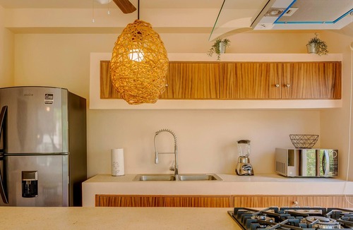 Costa Apartment | 2 Private Outdoor Lounge Patios | 2 Cenotes Onsite