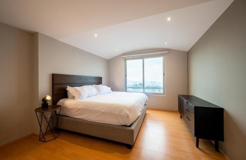 El Yaqui House | 2BR Santa Fe Style & Comfort with Gym & Parking