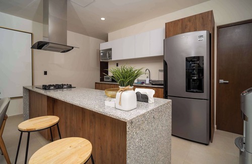 Cancun Apartment | 2BR Stylish Retreat | Rooftop Pool & Huayacán