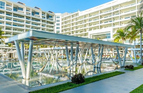 Playa Mujeres Condo | 2BR w/Wifi, W/D, resort and beach access, adults only rooftop, AI optional