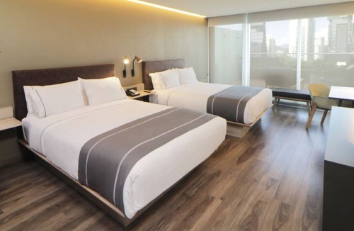 Providencia Hotel | 3 Boutique-Style Rooms in Trendy Providencia – Walk to Dining & Green Spaces