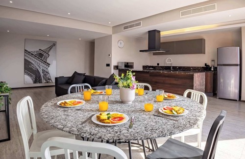Zona Minerva Apartment | 3BR retreat w/pool, patio & skyline views