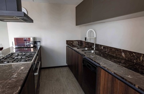 Zona Minerva Apartment | 3BR retreat w/pool, patio & skyline views