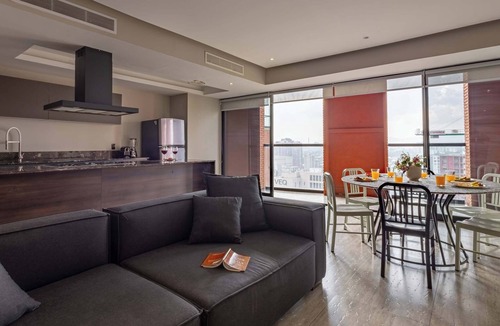 Zona Minerva Apartment | 3BR retreat w/pool, patio & skyline views