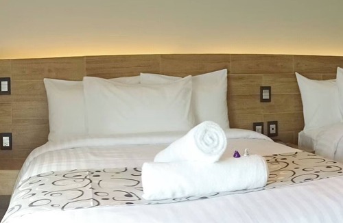 Downtown Cancun Hotel | 4 Conveniently Located Rooms Near Cancún Beaches and Amazing Local Food