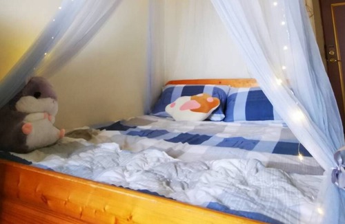 East District Apartment | A cozy room with story from FaFa