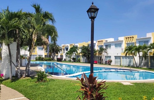 Diamante House | A home with a family-friendly atmosphere, close to the beach, shops, and the airport.